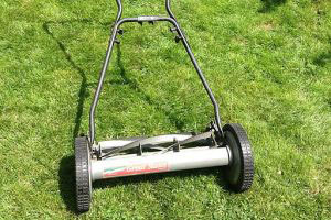 A fine old hand pushed lawn mower